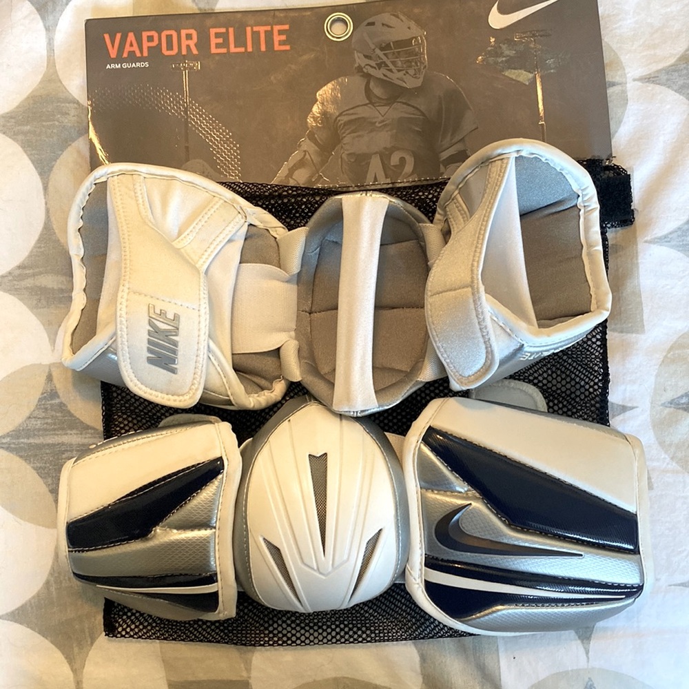 Lacrosse 2 items equipment arm guards and stick bag